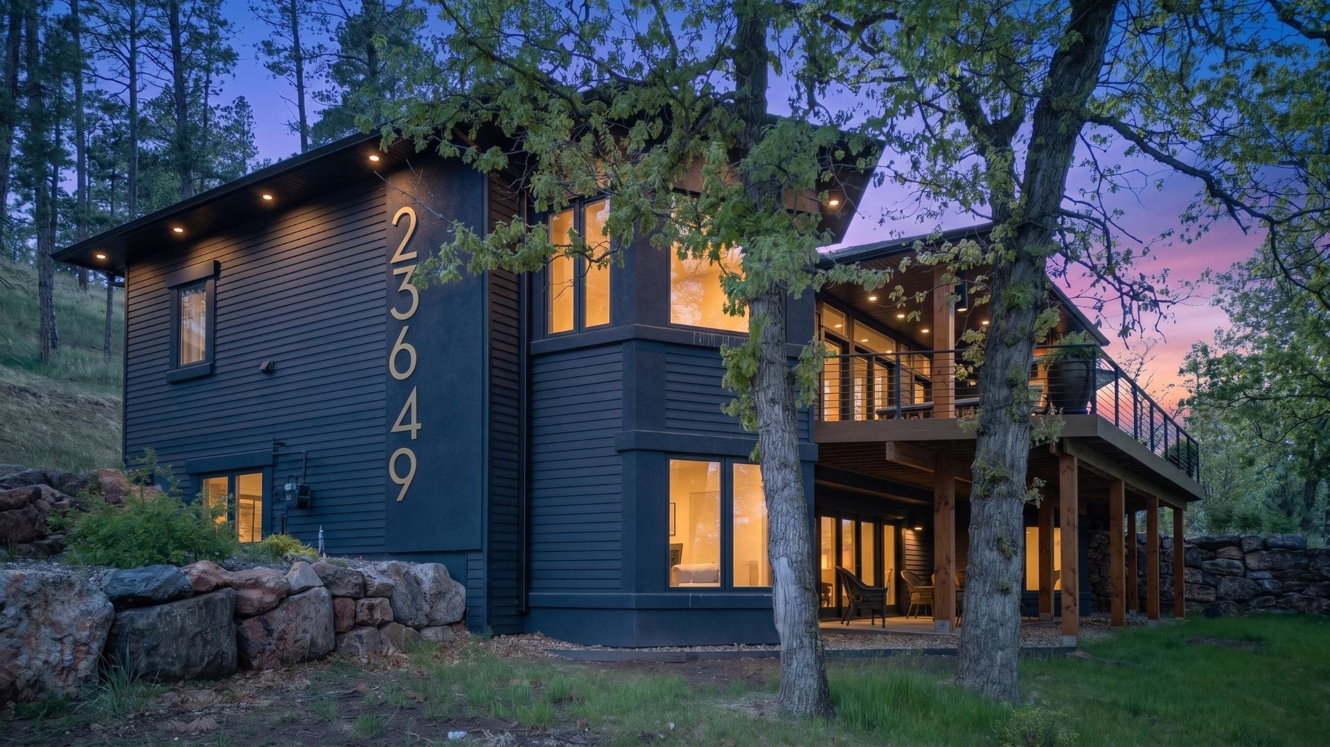 Twilight exterior photograph of a Black Hills home by Henry Roy