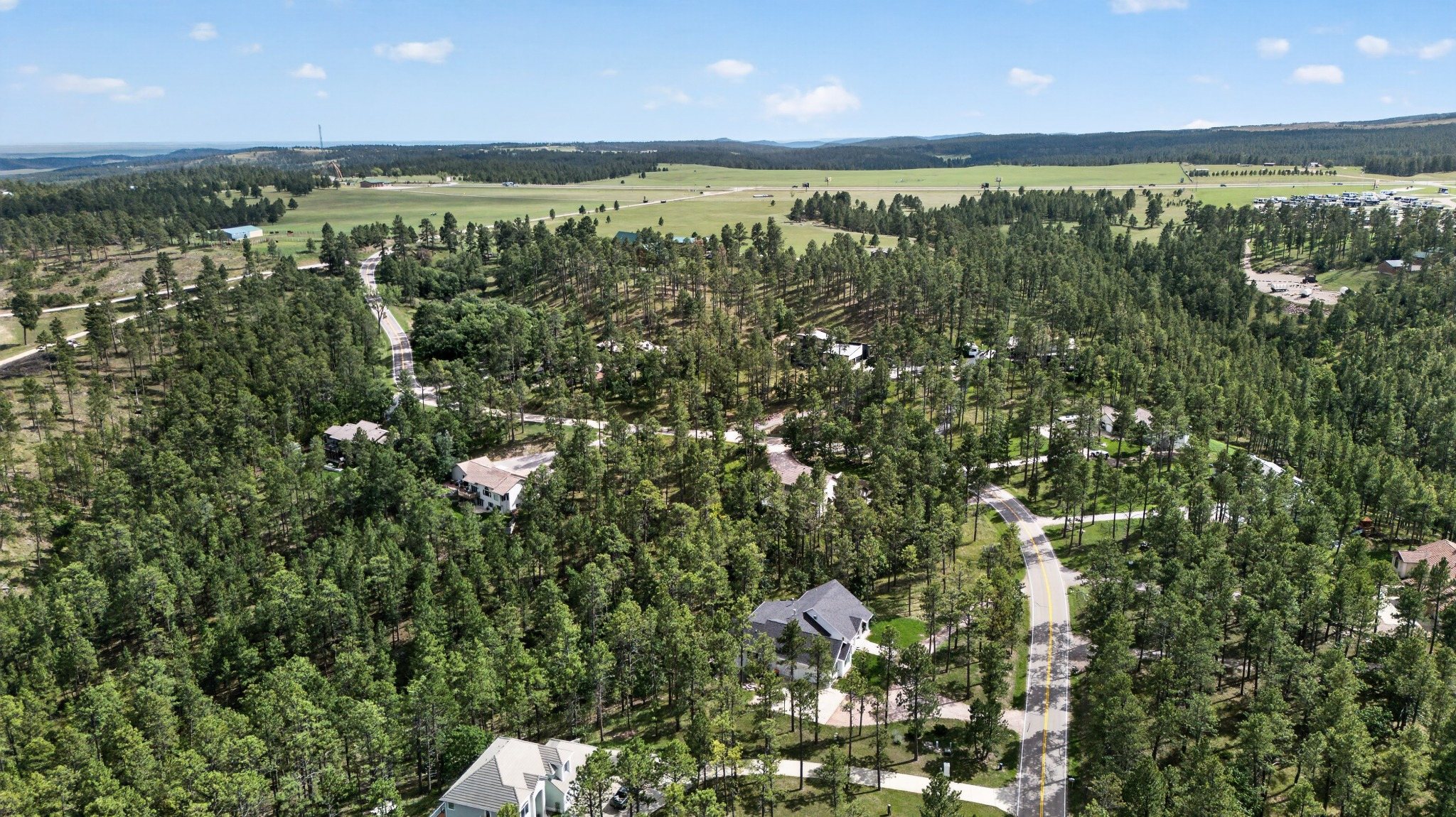 Aerial view of Copper Oaks homes among ponderosa pine southwest of Rapid City